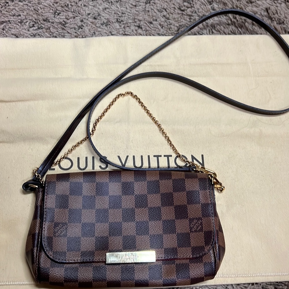 Louis Vuitton crossbody bag with detachable strap